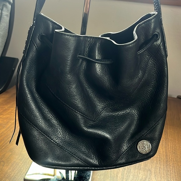 Vince Camuto Handbags - Vince Camuto black leather bucket crossbody bag, cinch top and tassels